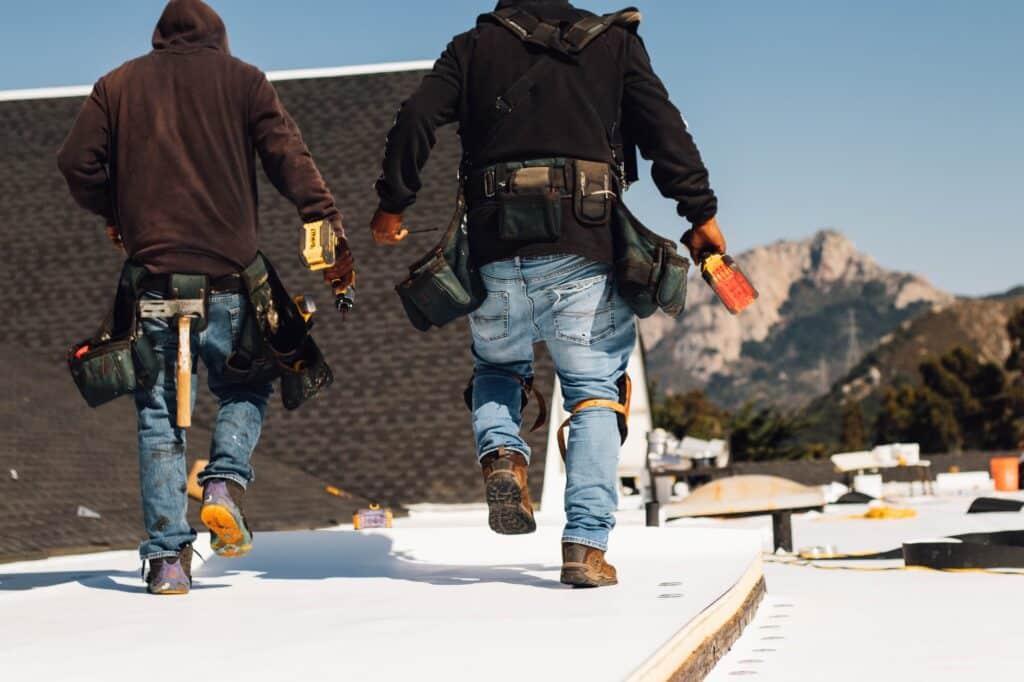 two roofers on the roof