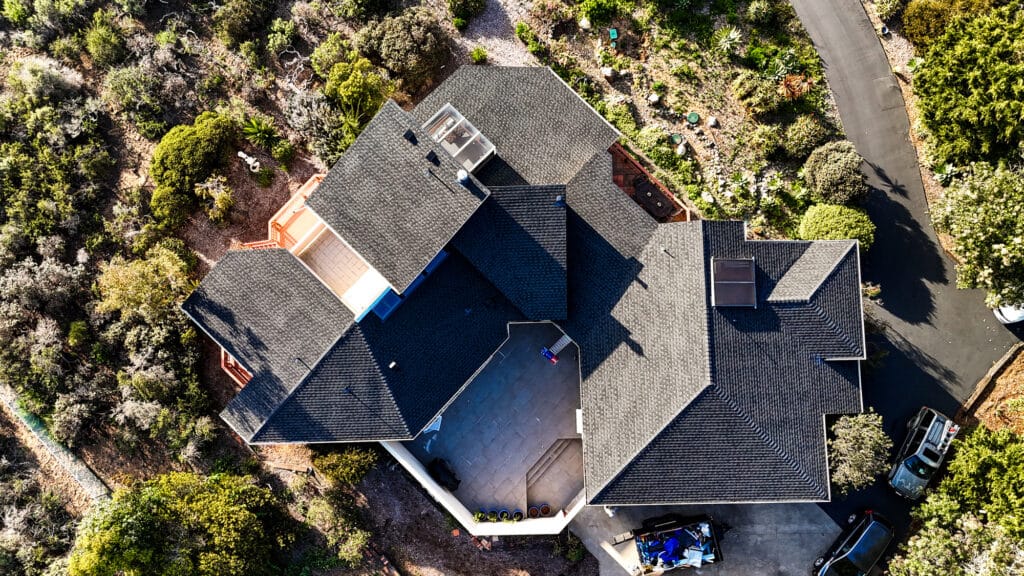 Aerial view of a large modern house roof.