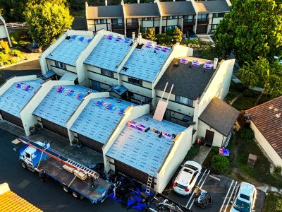 Drone view, residential roofs under construction.